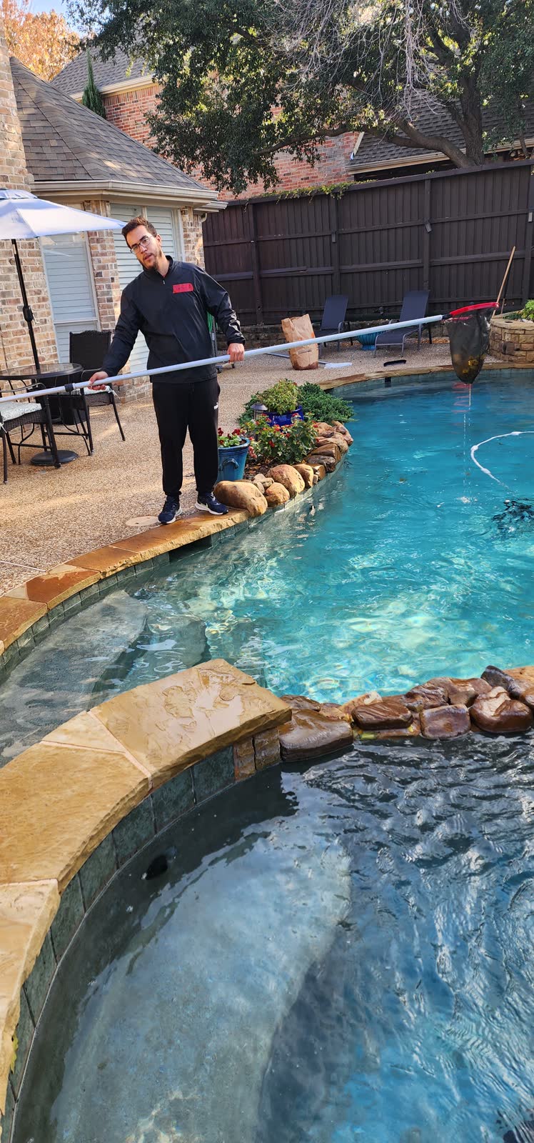 Pool area after professional power washing to restore your pool deck & patio.